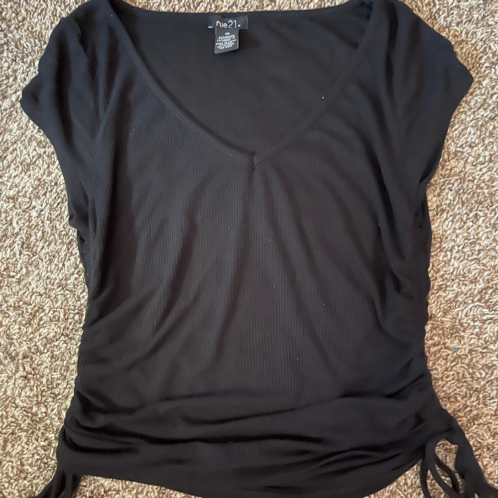 black skin tight shirt with ties on the side